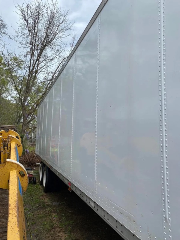 Fleet trailer after washing, panel clean and white