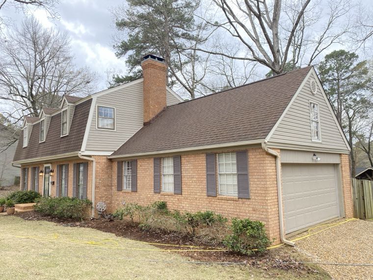 Brick and siding home in South Arkansas after a full exterior wash