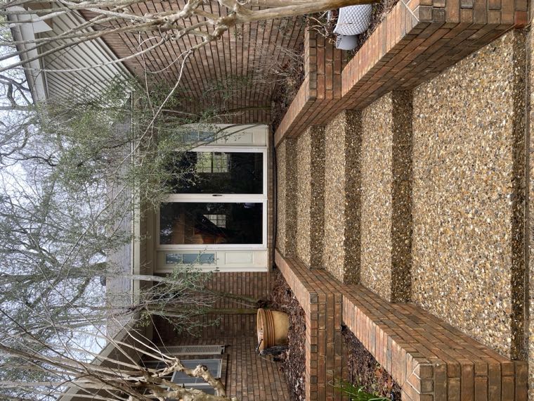 The same aggregate walkway after cleaning, gold stone visible